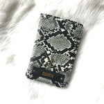 Snake Print Passport Cover With Customized Name And Charm Options.