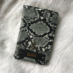 Snake Print Passport Cover With Customized Name And Charm Options.