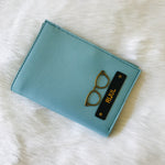 Premium Passport Covers With Customized Name And Charm Options.