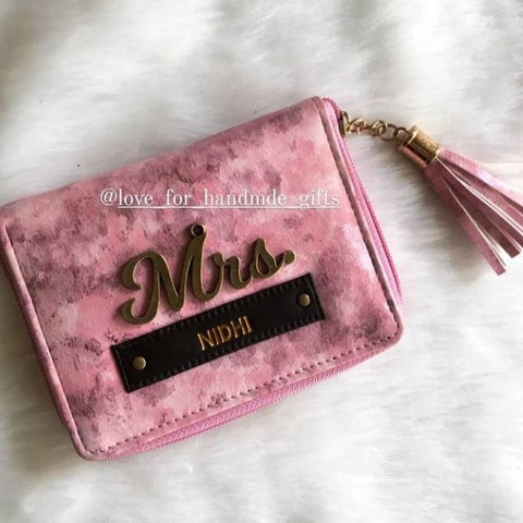 Tassle marble wallet for women.