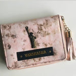 Tassle marble wallet for women.