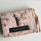 Tassle marble wallet for women.