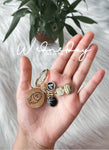 2 Engraved symbols with 1 charm and 1 letter