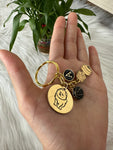 2 Engraved symbols with 1 charm and 1 letter